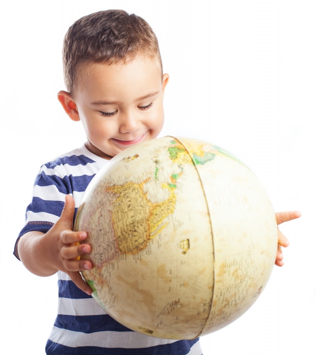 child-smiling-with-a-globe_1187-2637