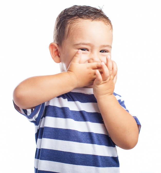 little-boy-covering-his-mouth-while-laughing_1187-2879