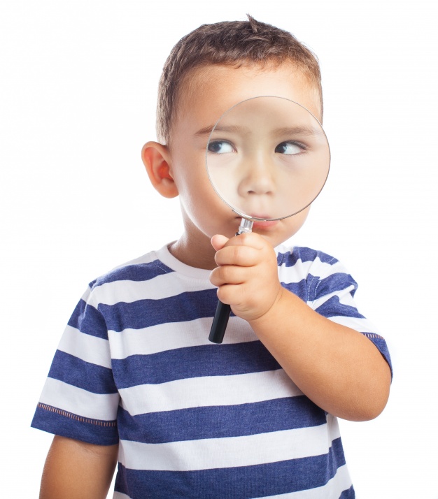 little-boy-with-a-magnifying-glass_1187-2677